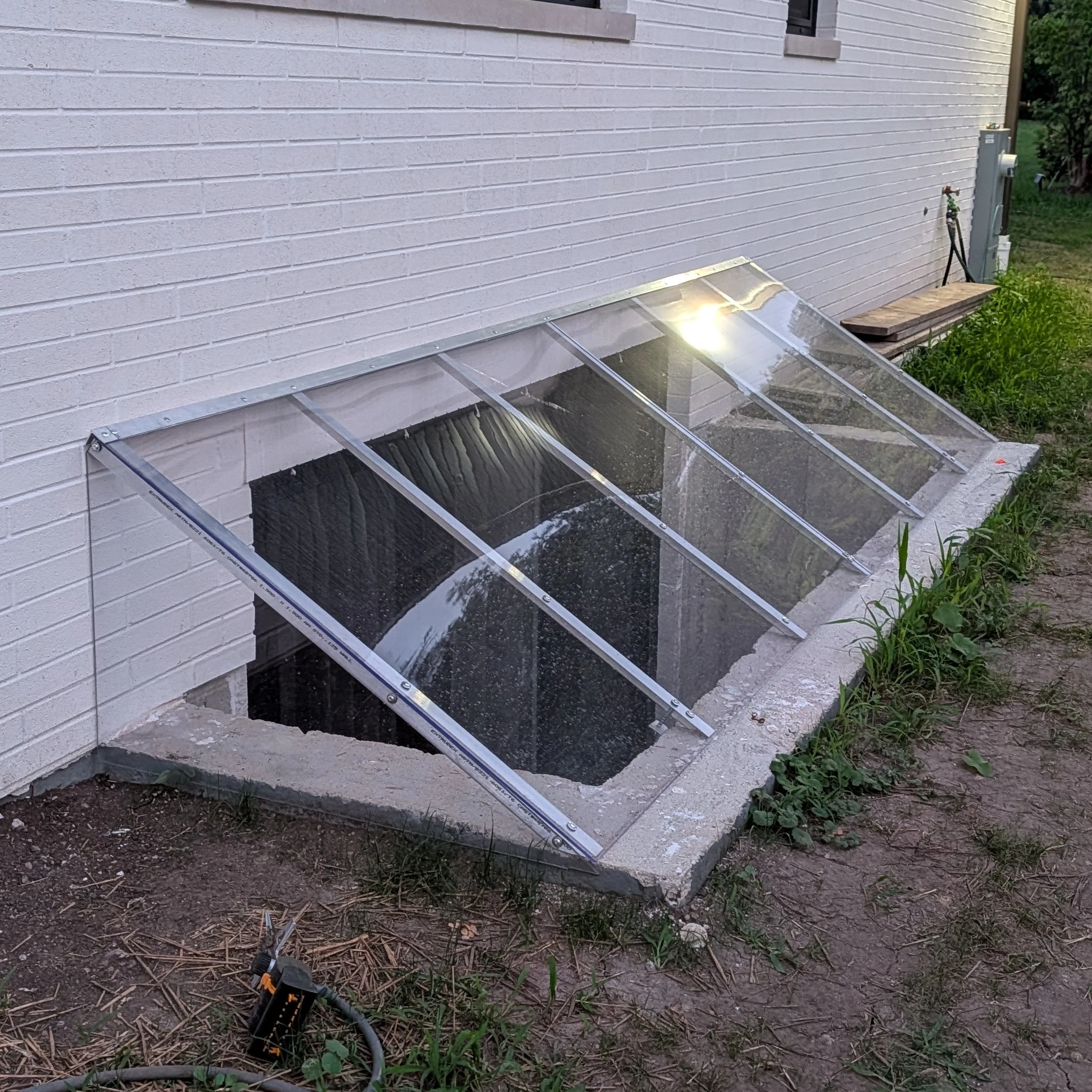 Atrium Style Slanted Window Well Covers
