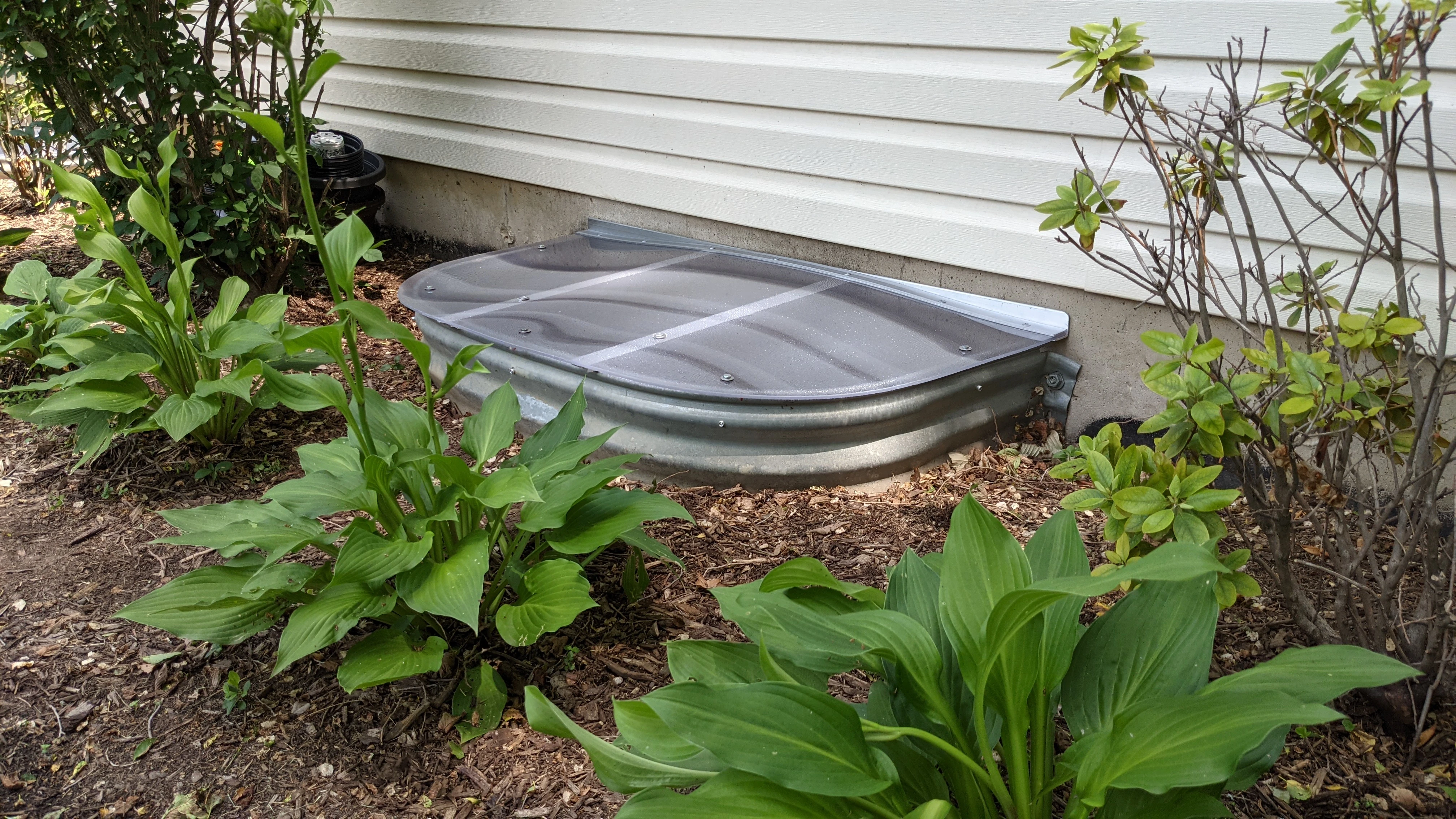 Benefits of Custom Window Well Covers